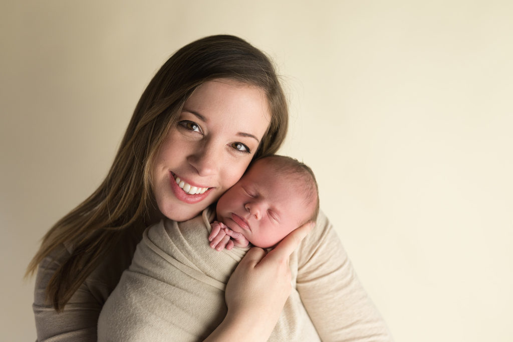why hire a newborn photographer Cedar Rapids photography