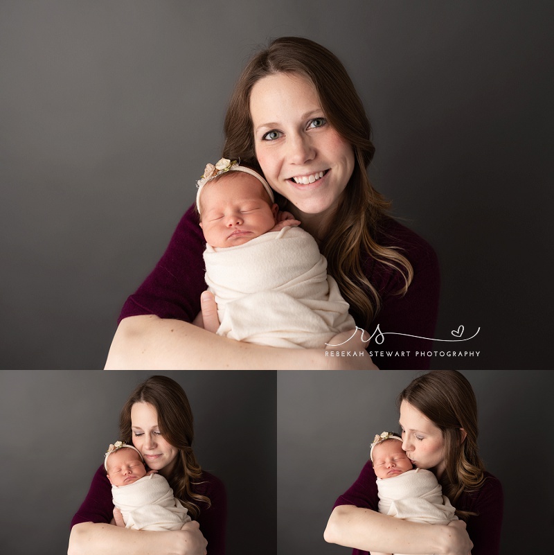 A gorgeous new mother snuggles her newborn baby girl during her Cedar Rapids photography session