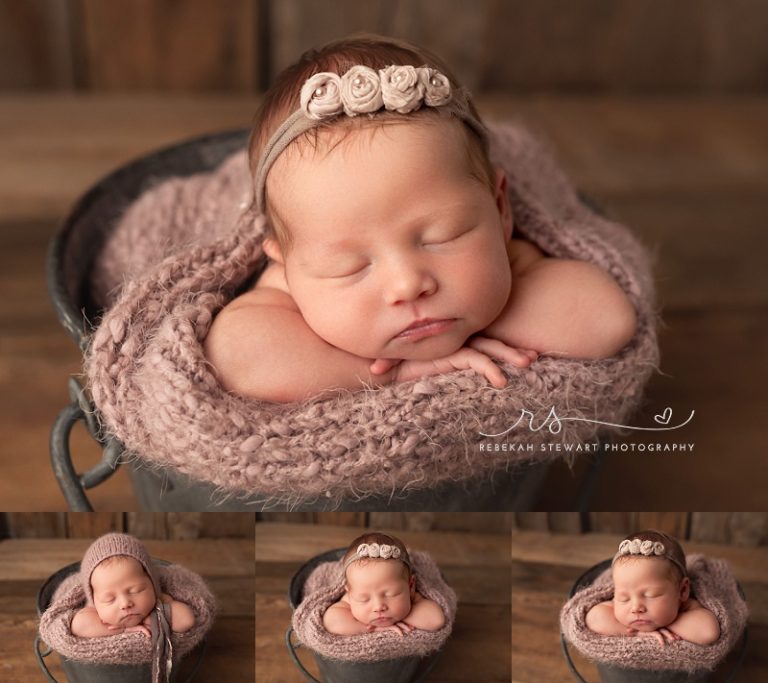 A beautiful baby sister is posed in a bucket during her Cedar Rapids newborn photography session