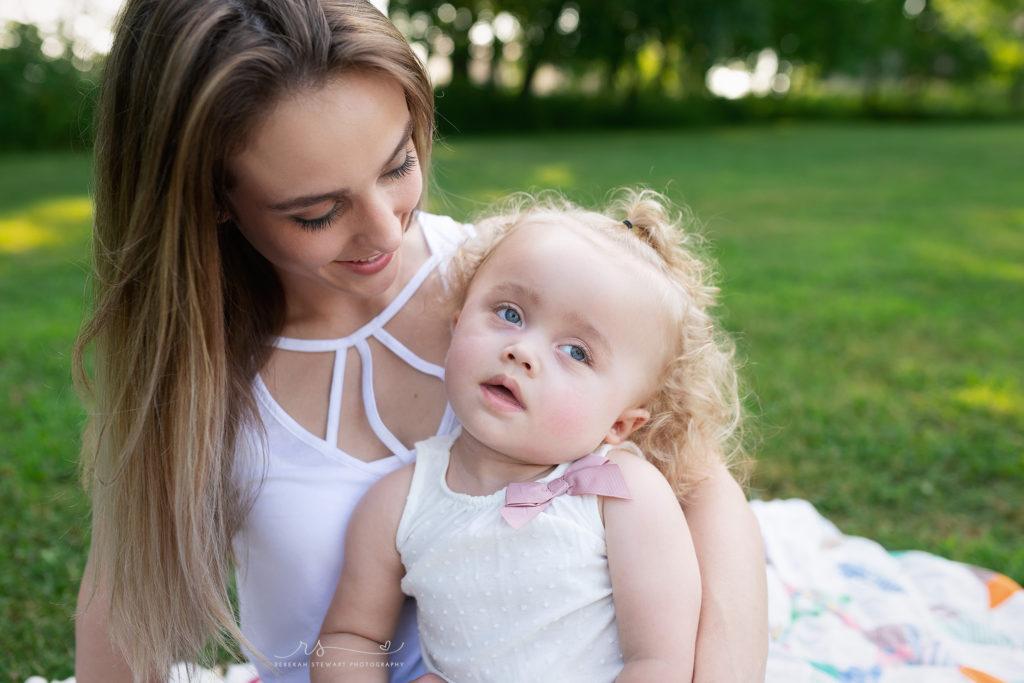 Tobin Grace with Canavan Disease is photographed during her session in Cedar Rapids