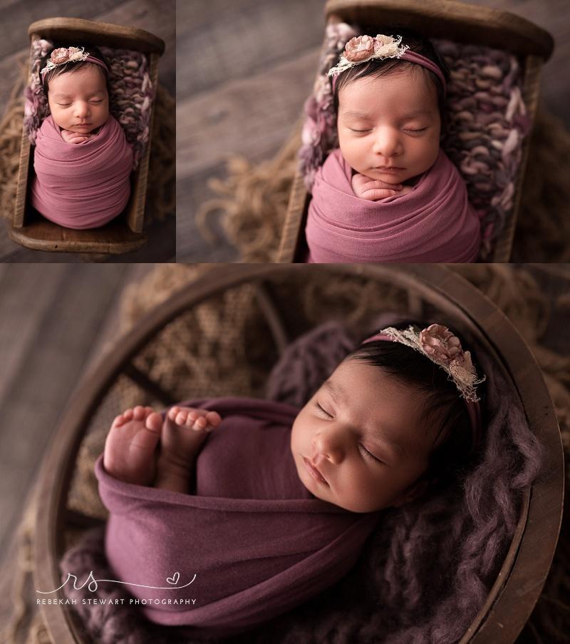 A sweet newborn girl sleeps during her photo session in Cedar Rapids with Rebekah Stewart Photography