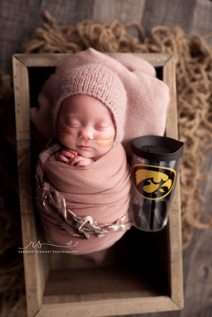 NICU graduate - a 25 week preemie has her newborn photo session in Cedar Rapids 