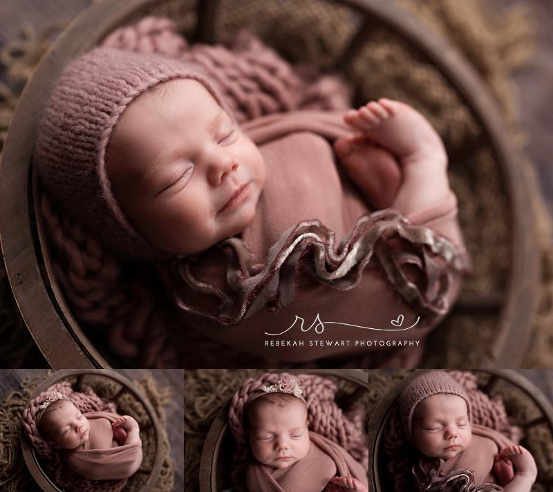 A baby sleeps during her newborn photos in Cedar Rapids