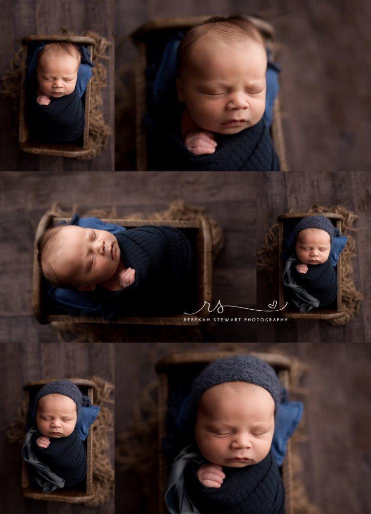 handsome newborn boy - cedar rapids baby photos - a newborn baby boy sleeps wrapped in blue during his photography session